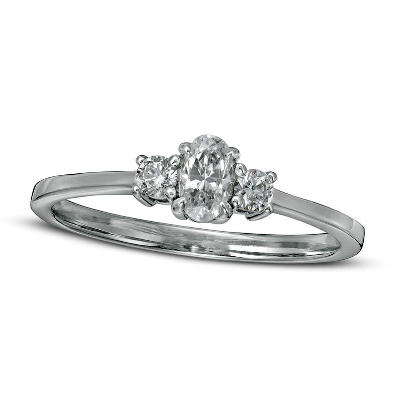 Image of ID 1 050 CT TW Oval and Round Natural Diamond Three Stone Engagement Ring in Solid 14K White Gold