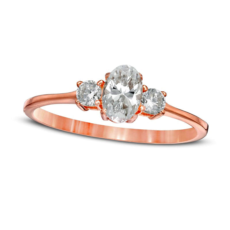 Image of ID 1 063 CT TW Oval and Round Natural Diamond Three Stone Engagement Ring in Solid 14K Rose Gold