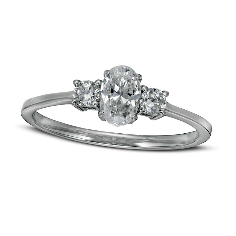 Image of ID 1 063 CT TW Oval and Round Natural Diamond Three Stone Engagement Ring in Solid 14K White Gold