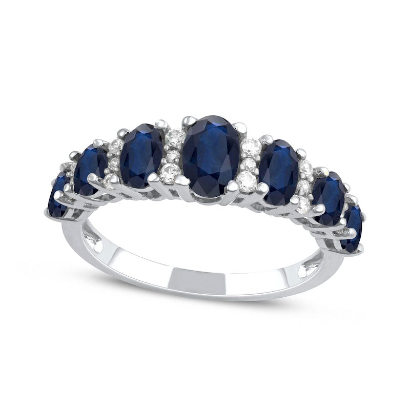 Image of ID 1 Oval Blue Sapphire and 017 CT TW Natural Diamond Graduated Seven Stone Alternating Trios Ring in Solid 10K White Gold