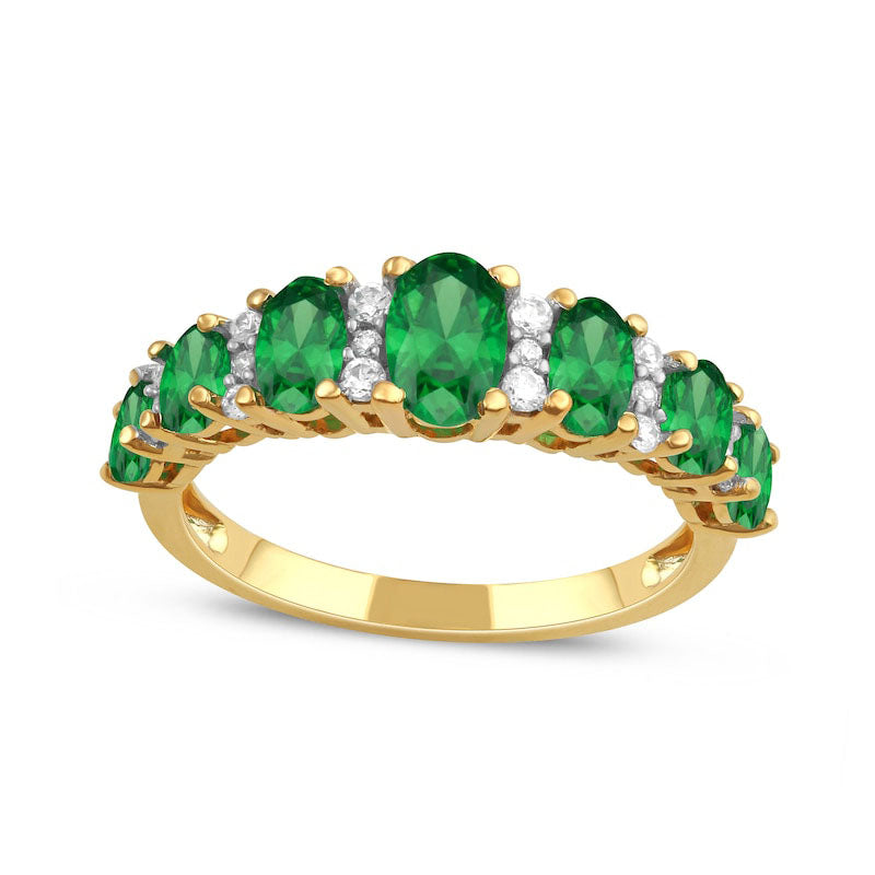 Image of ID 1 Oval Emerald and 017 CT TW Natural Diamond Graduated Seven Stone Alternating Trios Ring in Solid 10K Yellow Gold