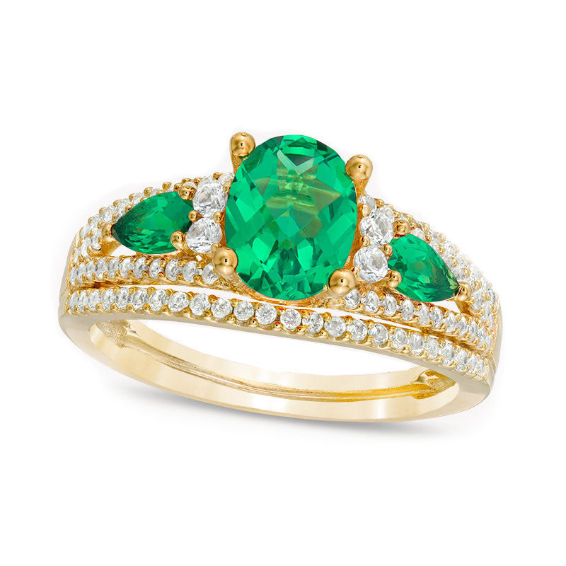 Image of ID 1 Oval Lab-Created Emerald and 050 CT TW Diamond Three Stone Ring in Solid 10K Yellow Gold