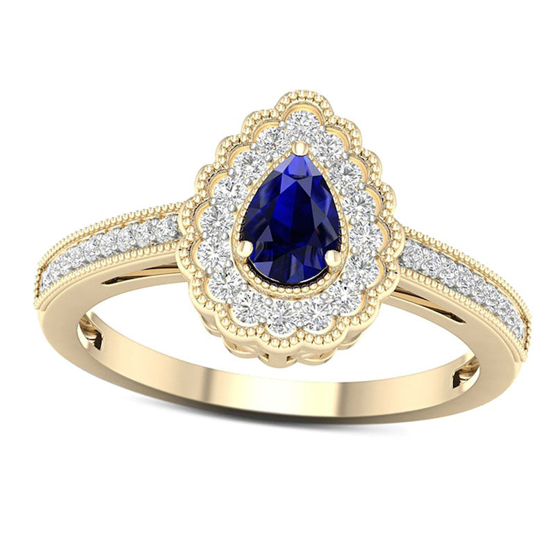 Image of ID 1 Pear-Shaped Blue Sapphire and 020 CT TW Natural Diamond Scallop Frame Antique Vintage-Style Ring in Solid 10K Yellow Gold